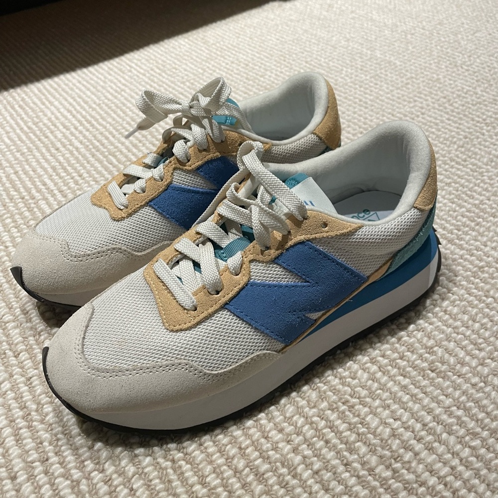 Women’s New Balance 237, size 7, never worn.